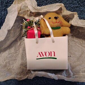 Avon Christmas Ornament Dog in a bag 3 1/2" X 2 1/2 " New